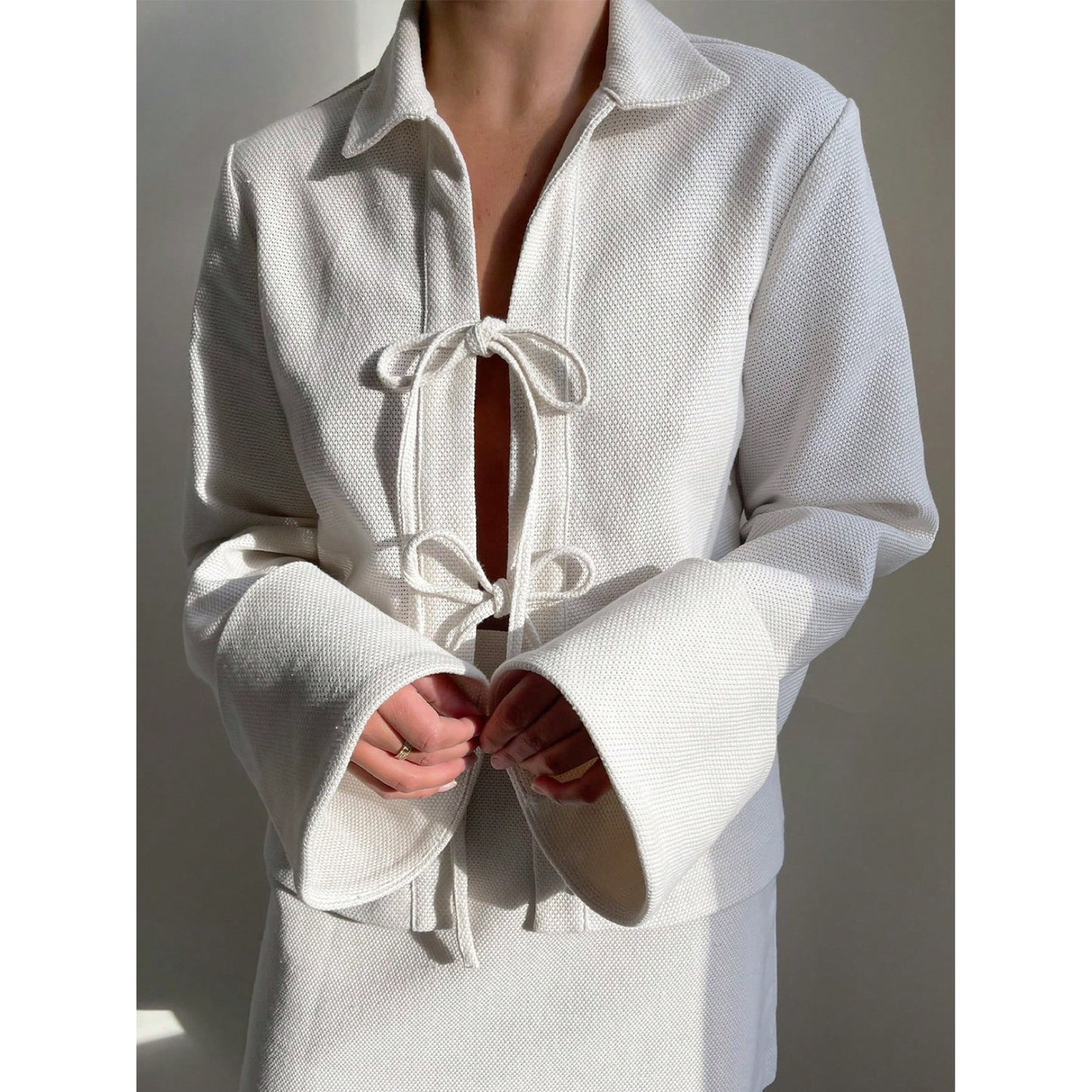 Bow Top with Bell Sleeves and Plunging Neckline