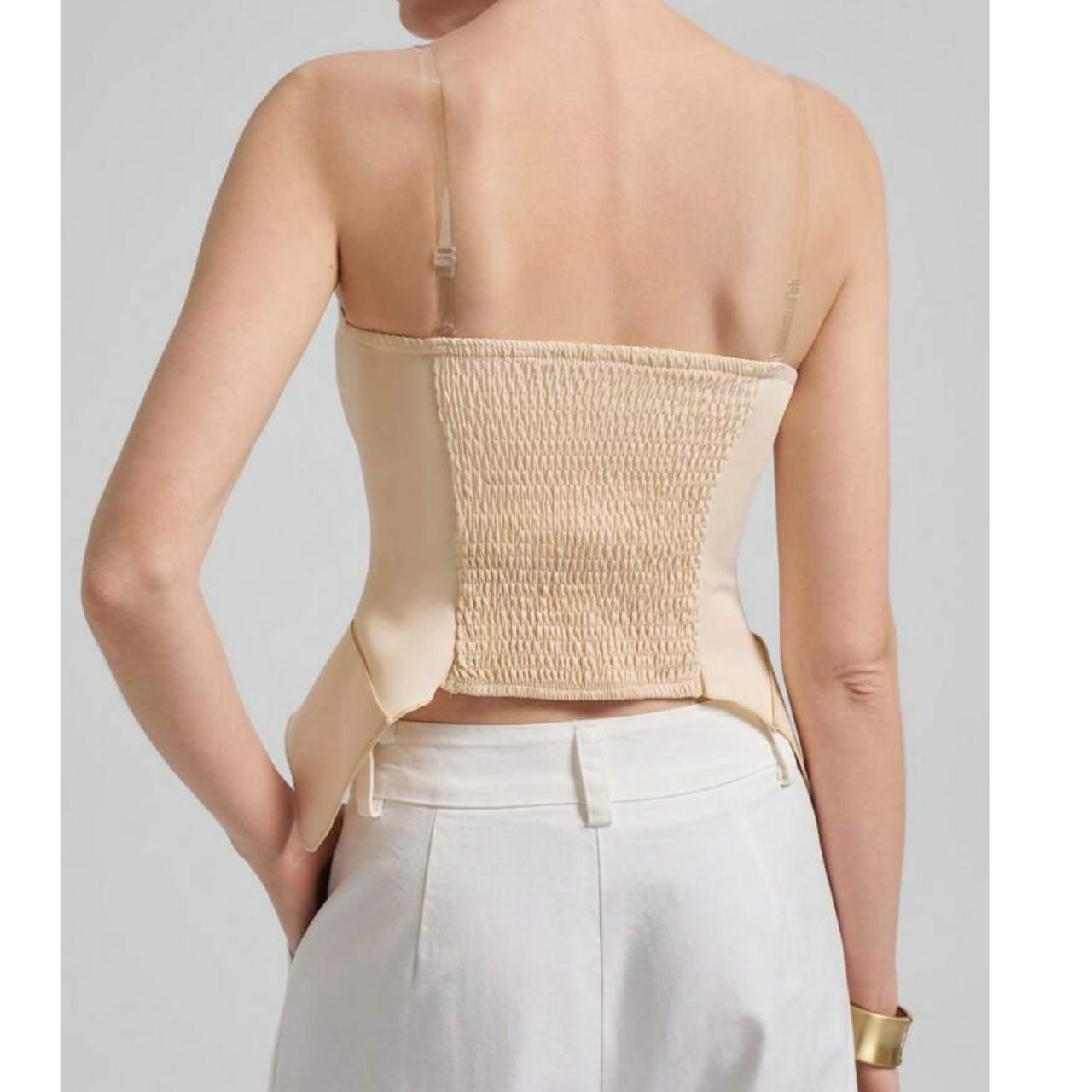 Top Strapless con Peplum